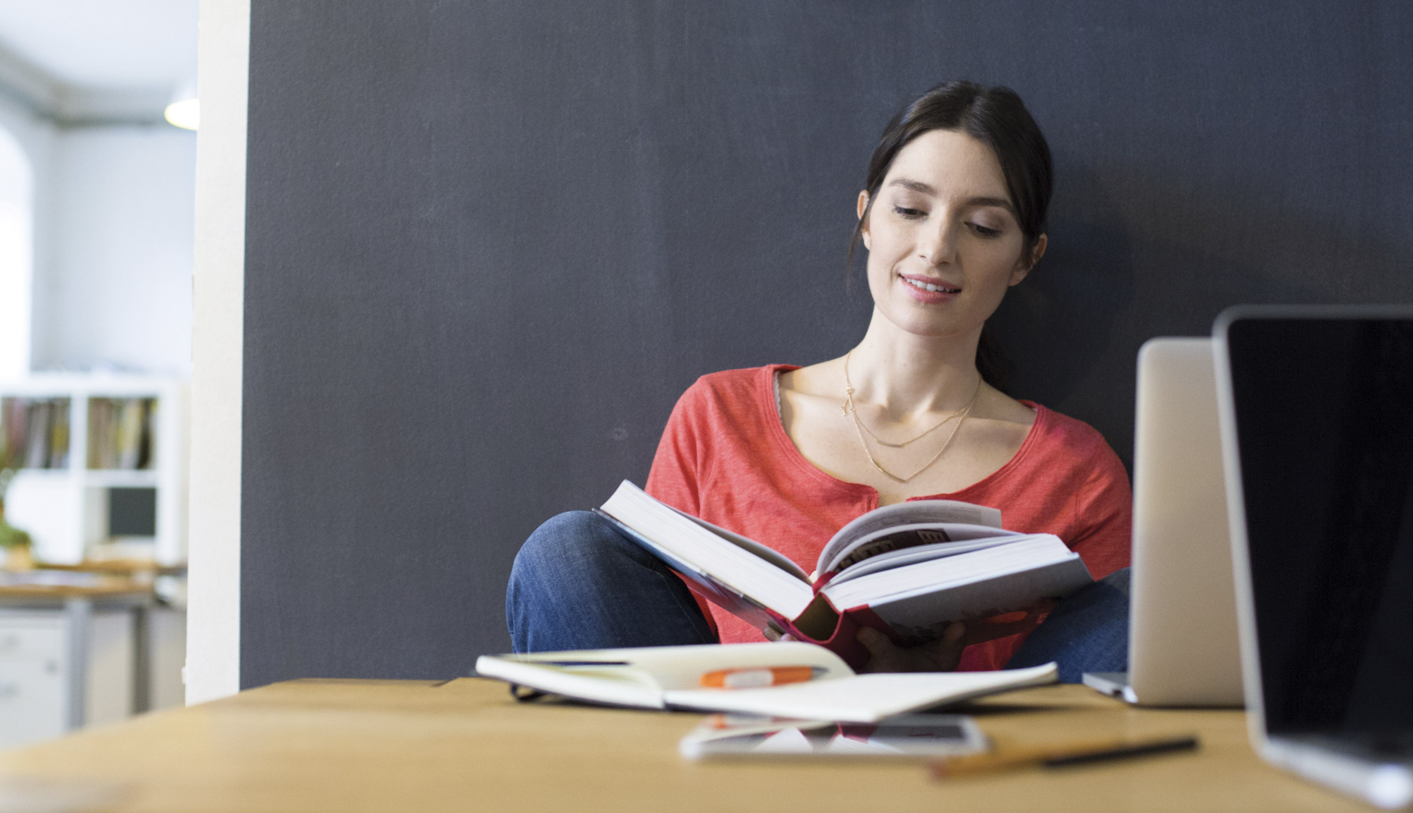 person reading books image